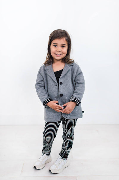 Girl wearing grey organic cotton blazer made by Author Clothing.