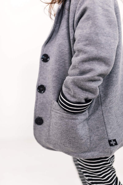 Grey organic cotton blazer for kids.  Large black buttons.  Ethically made designed in Canada.