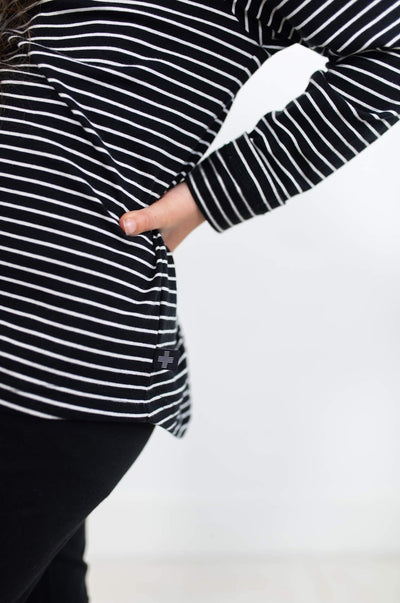Black long sleeve shirt with white stripes.  Made from organic cotton.